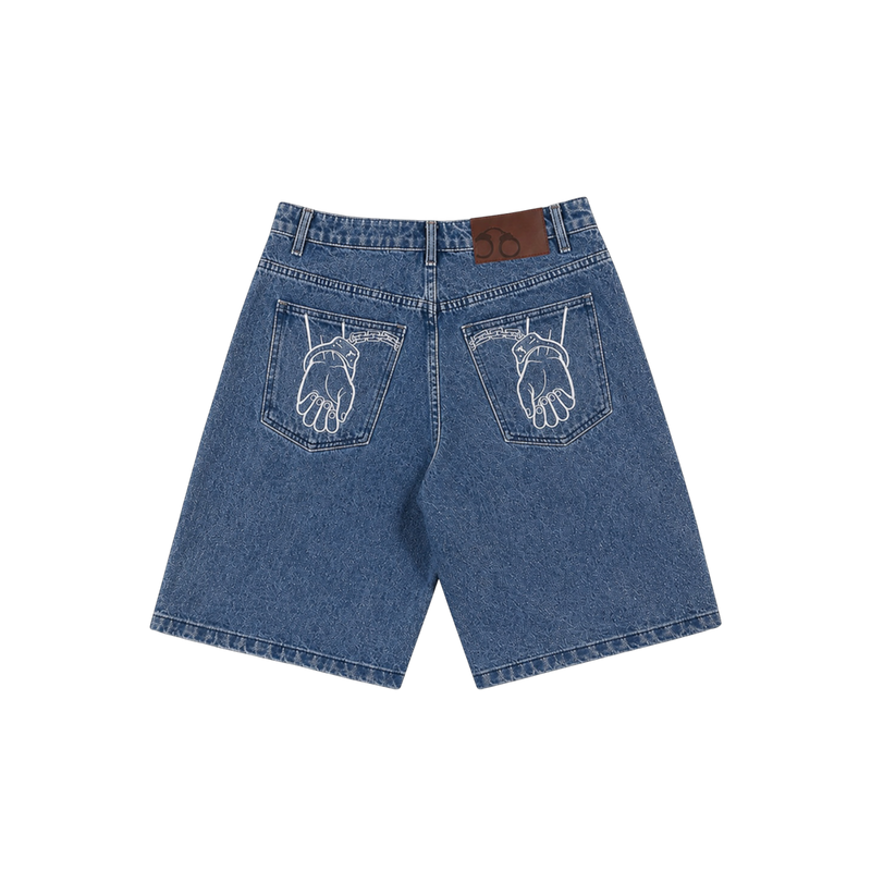 CROOKSLDN blue wash denim jorts with baggy fit and white embroidered handcuff artwork on back pockets