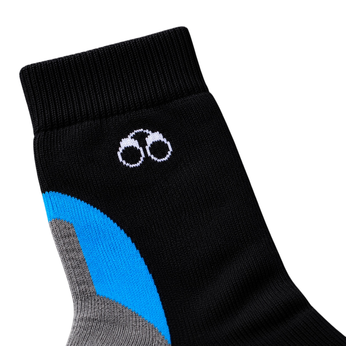 Close-up of a black/blue MotionTec sock: ribbed cuff, white handcuff logo, blue panel