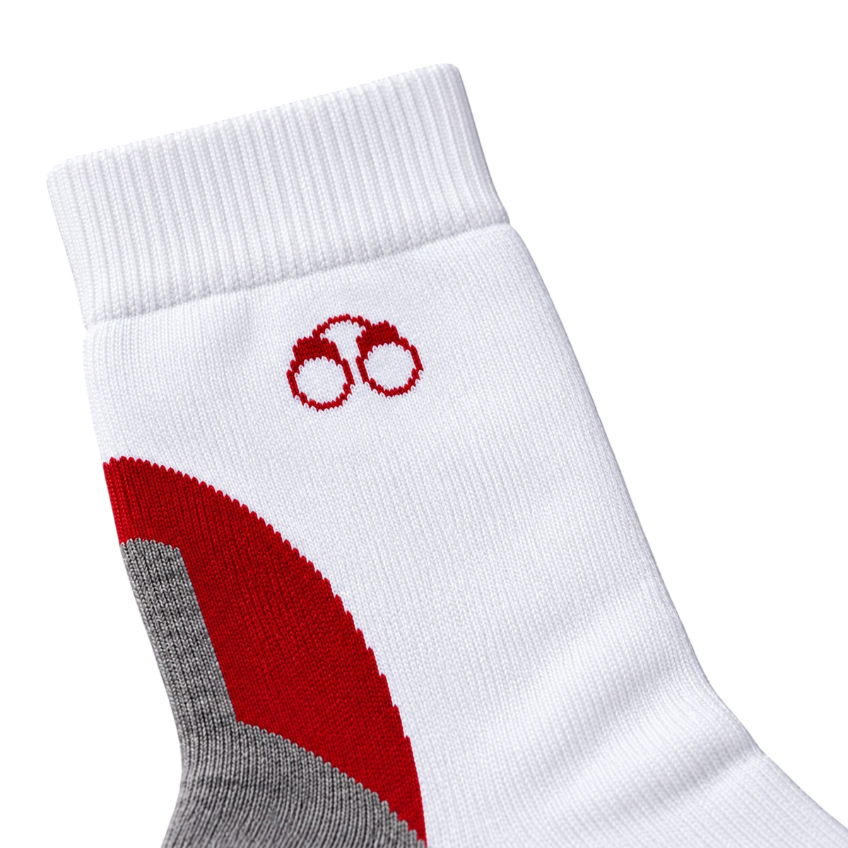 Close-up of a white/red MotionTec sock: ribbed cuff, red handcuff logo, red panel